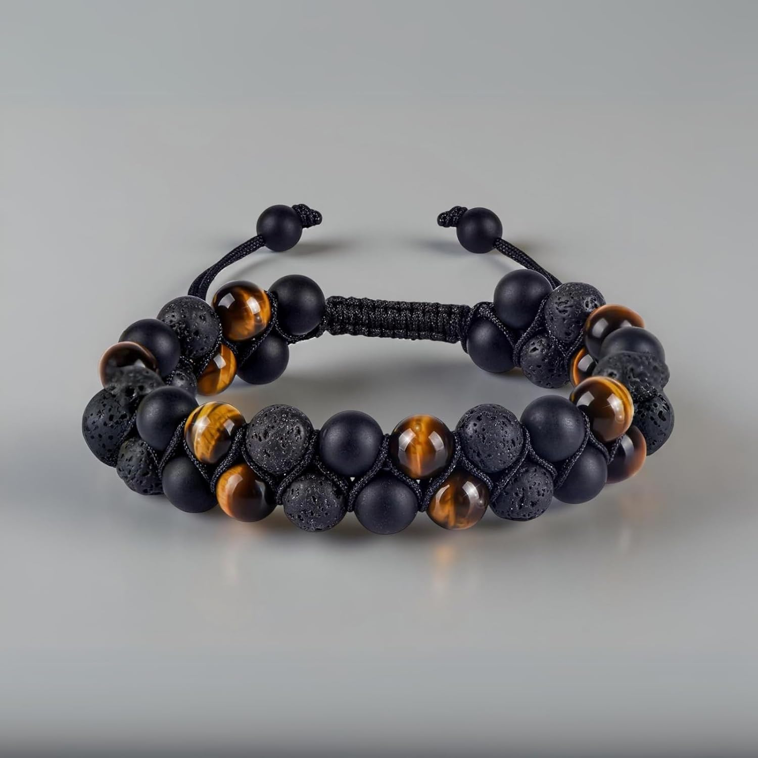 Volcanic Rock, Black Onyx, and Tiger's Eye 8mm Natural Stone Beads | An energy bracelet to help you stay grounded, boost your confidence, attract wealth and good fortune, and relieve stress