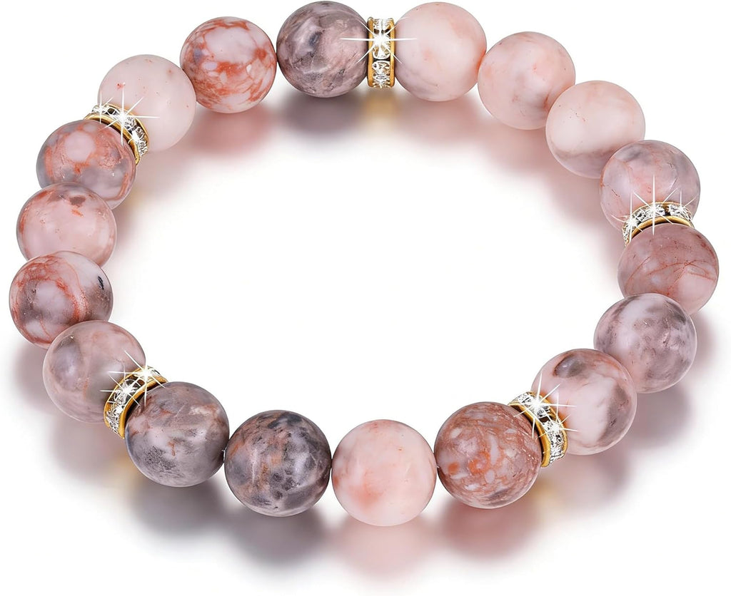 Healing Bead Bracelet—A rose quartz and chakra crystal bracelet that helps relieve anxiety and reduce stress; this soothing, stretchy bracelet calms both body and mind, making it perfect for yoga, meditation, and everyday wear