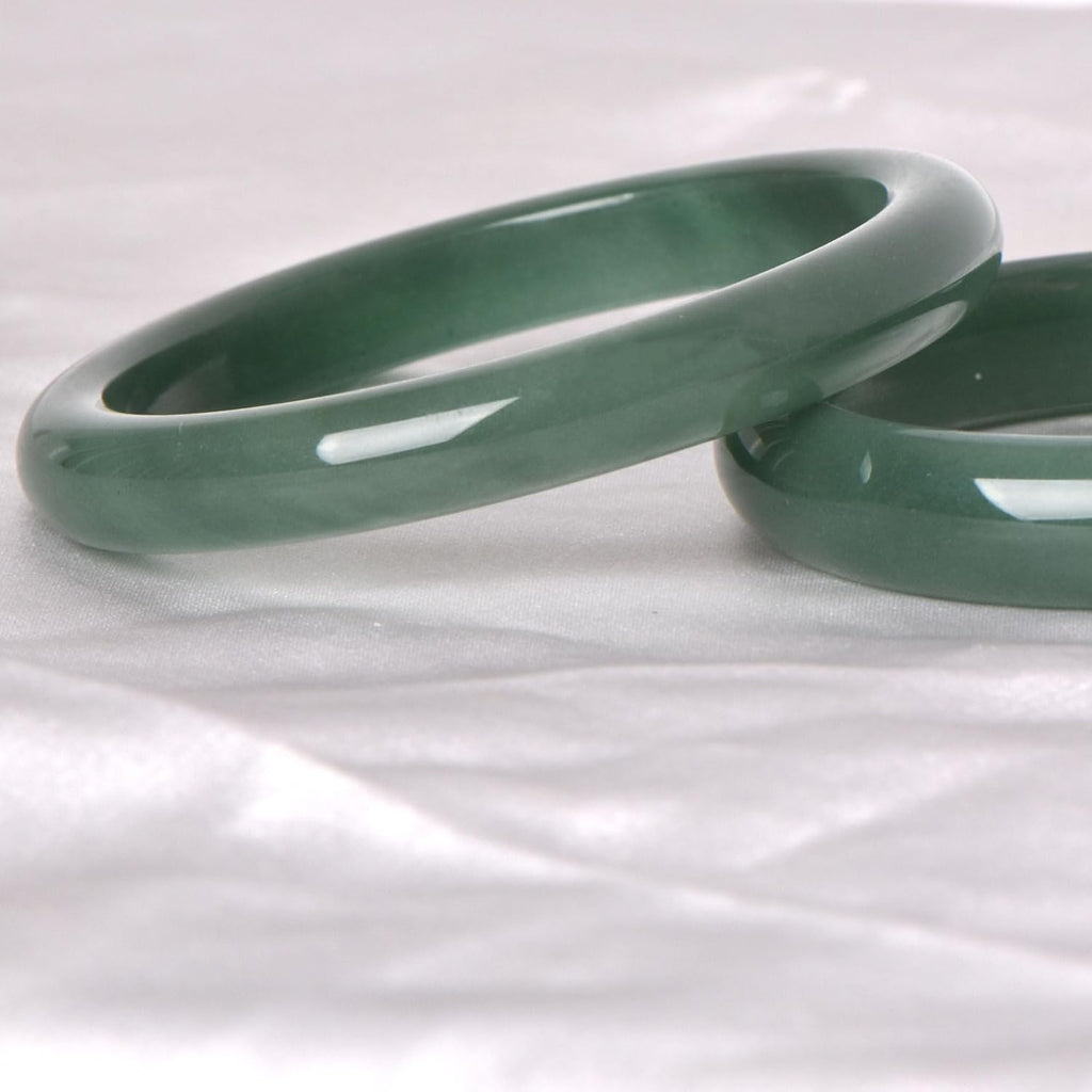 Green natural jade bracelet, known for its healing, protective, and wealth-attracting properties; natural gemstone feng shui jewelry