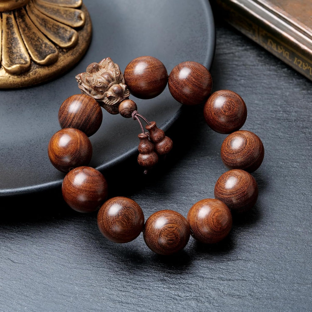A 20-millimeter-diameter bracelet made of 12 hand-carved wooden beads, adorned with a carved dragon design