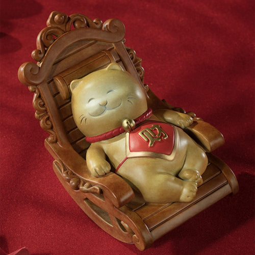Solid brass beckoning cat with rocking chair product photo